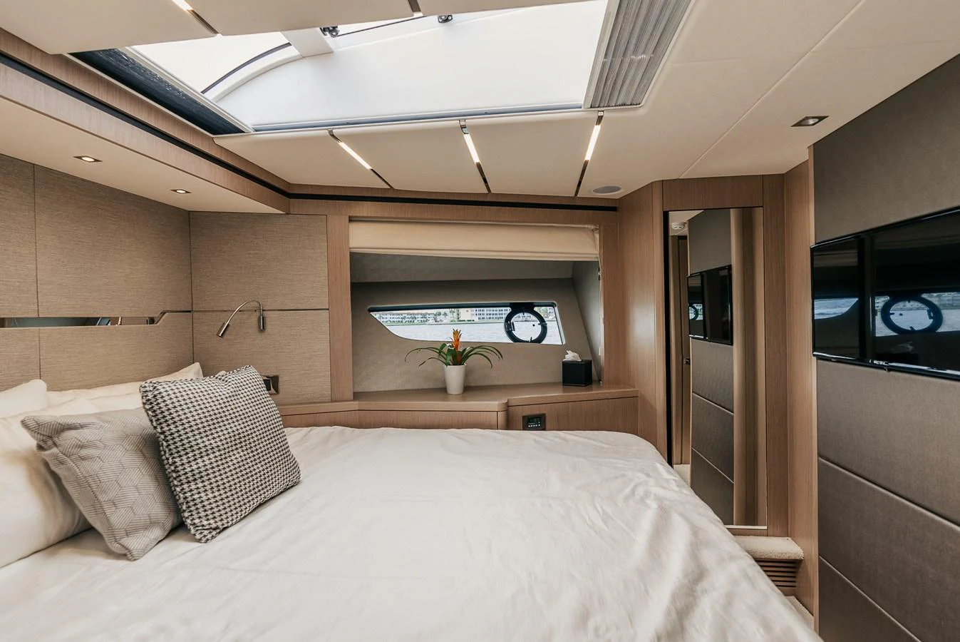 a bed in a room aboard GRAVITAS Yacht for Sale