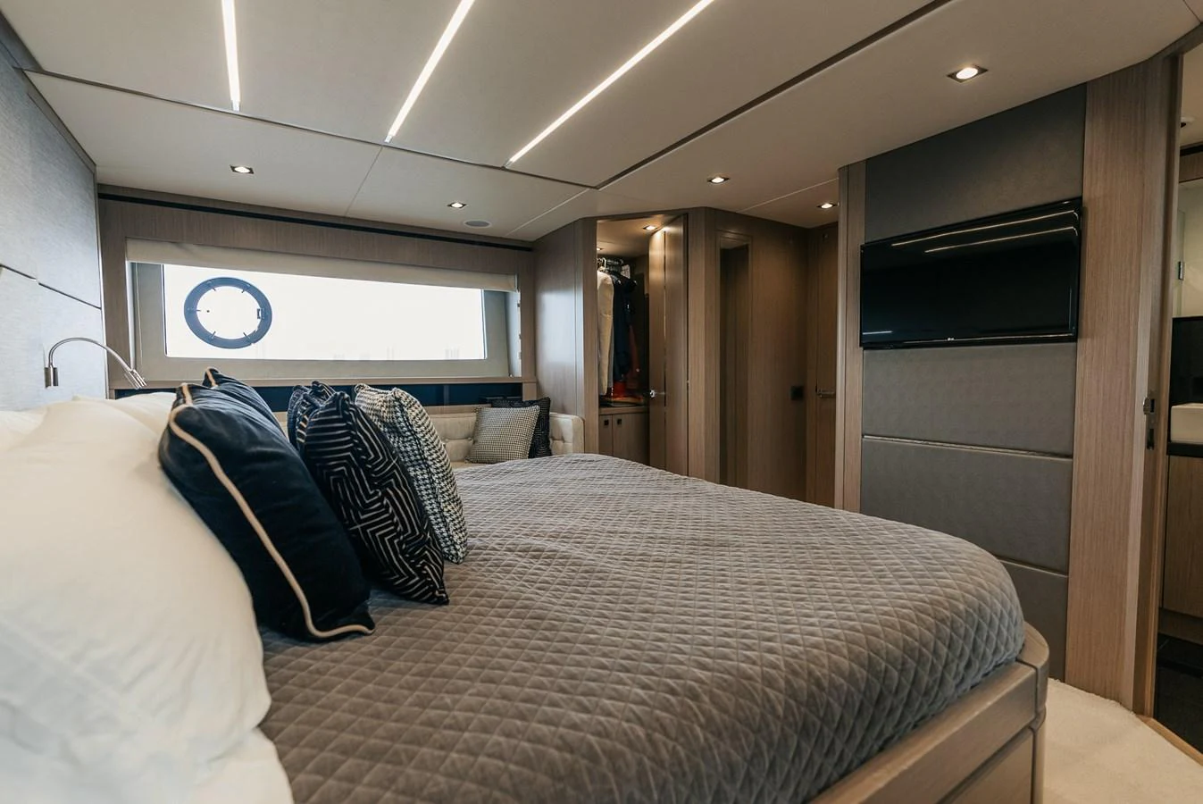 a bed in a room aboard GRAVITAS Yacht for Sale