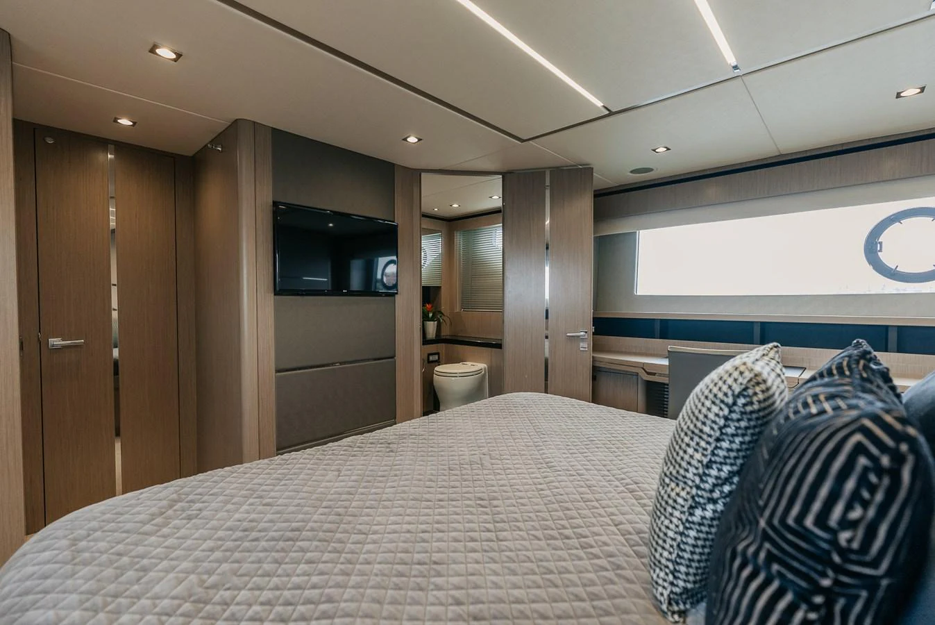 a bed in a room aboard GRAVITAS Yacht for Sale