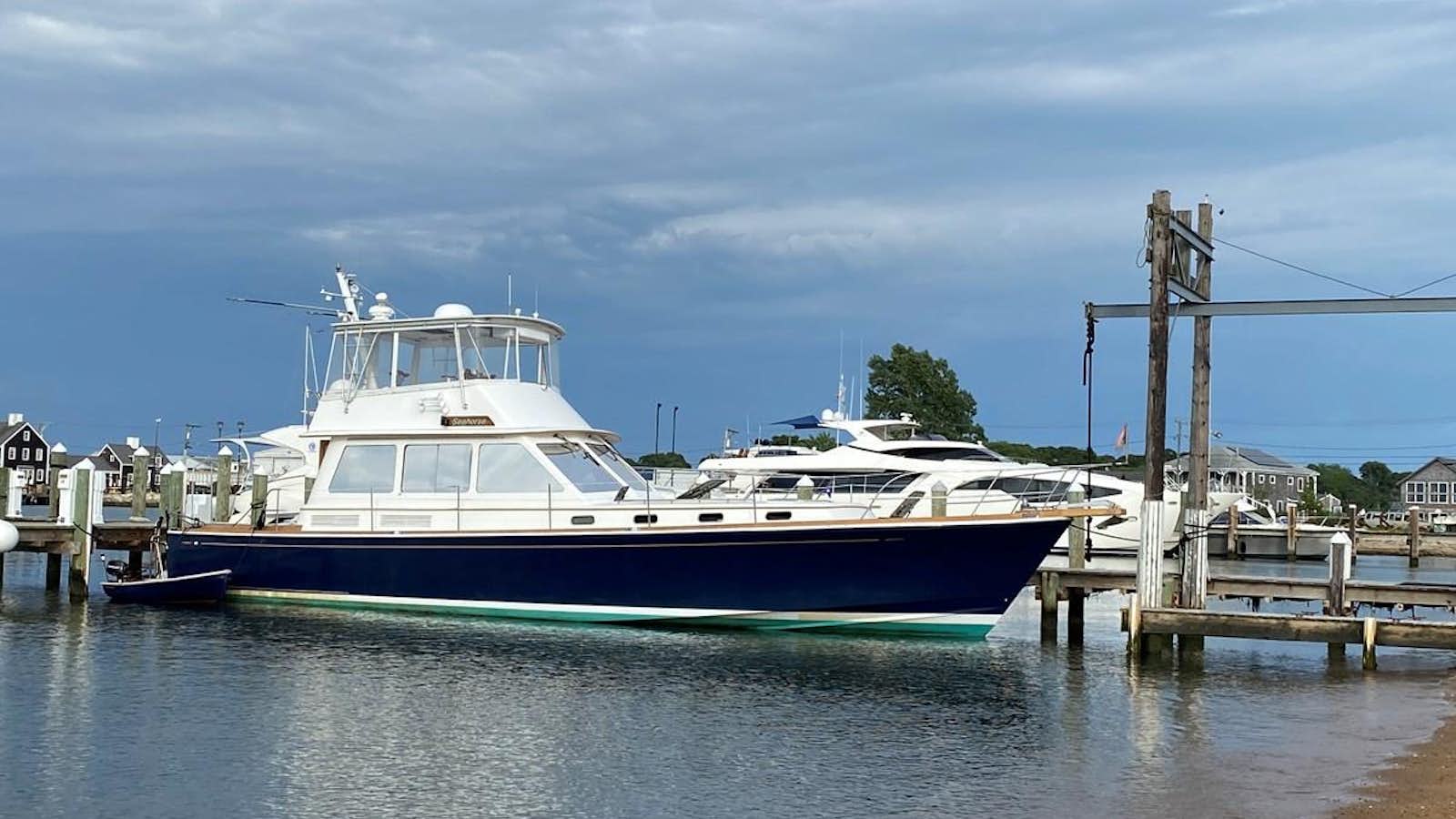 a boat docked at a pier aboard Seahorse Yacht for Sale