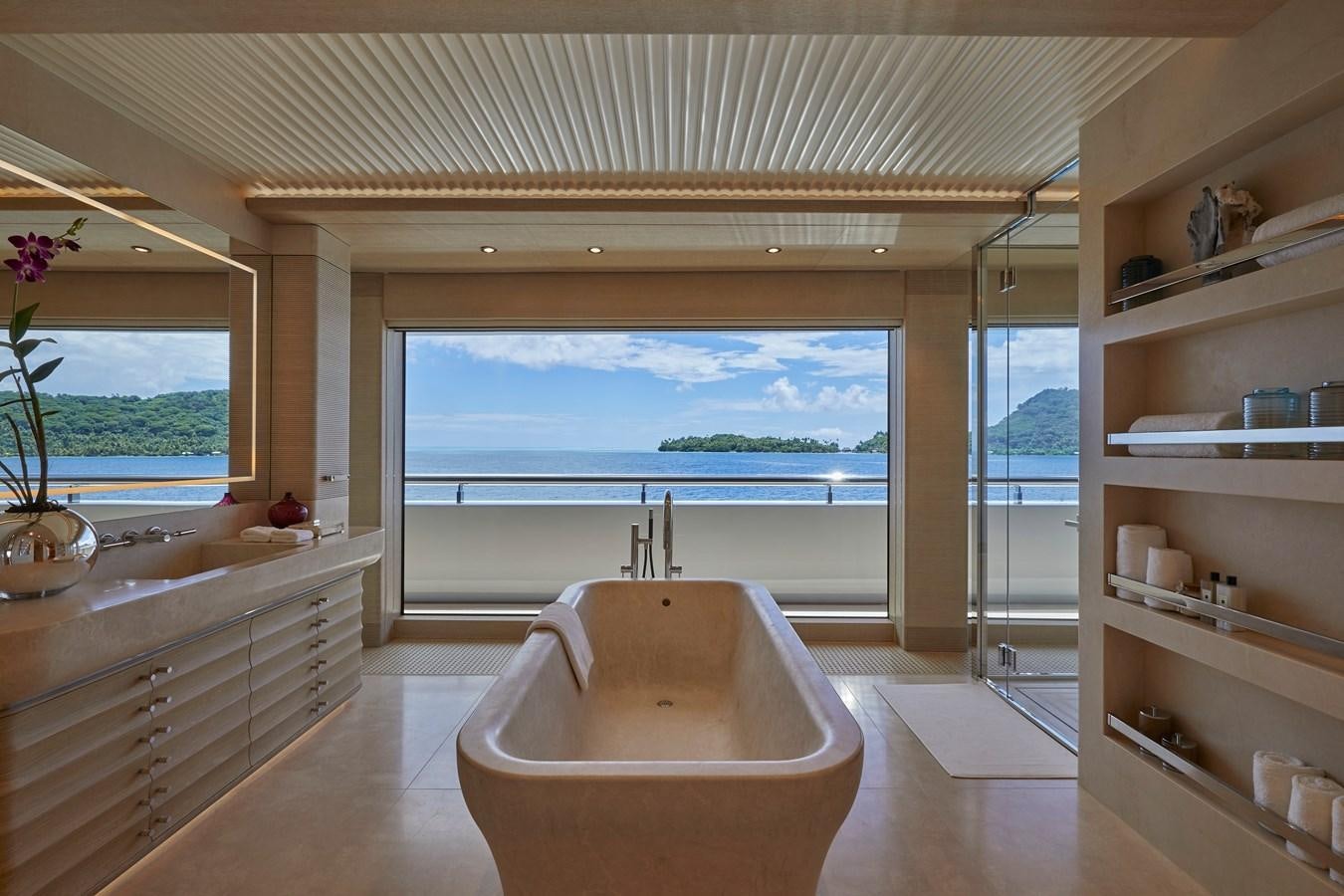 a large bathroom with a large window aboard IJE Yacht for Sale