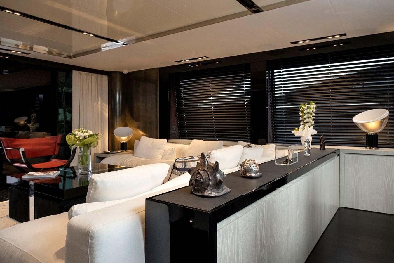 a room with a table chairs and a window aboard ALIX Yacht for Sale