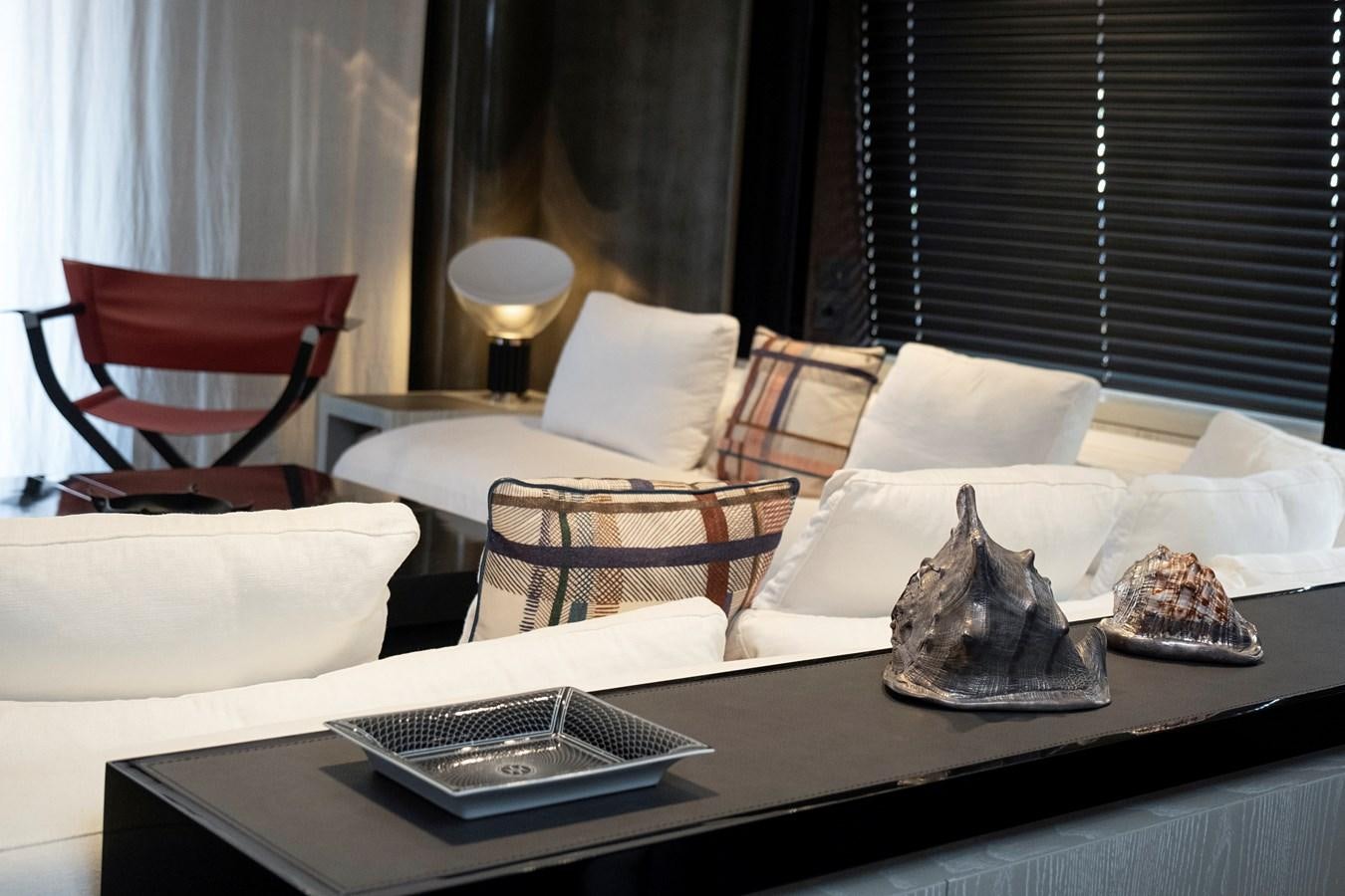 a bed with a tray of food aboard ALIX Yacht for Sale