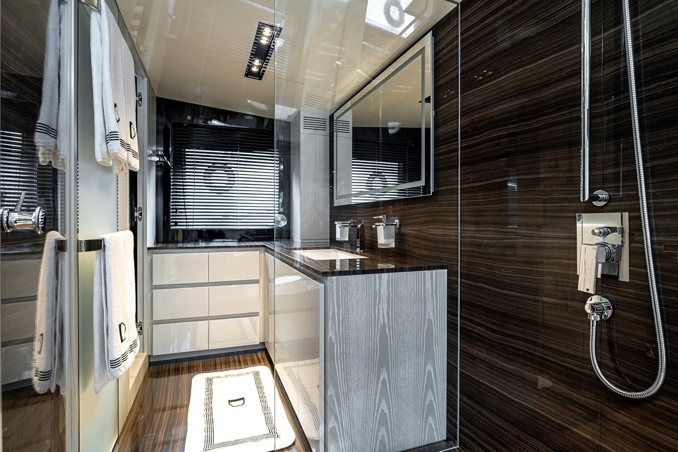a kitchen with a sink and cabinets aboard ALIX Yacht for Sale