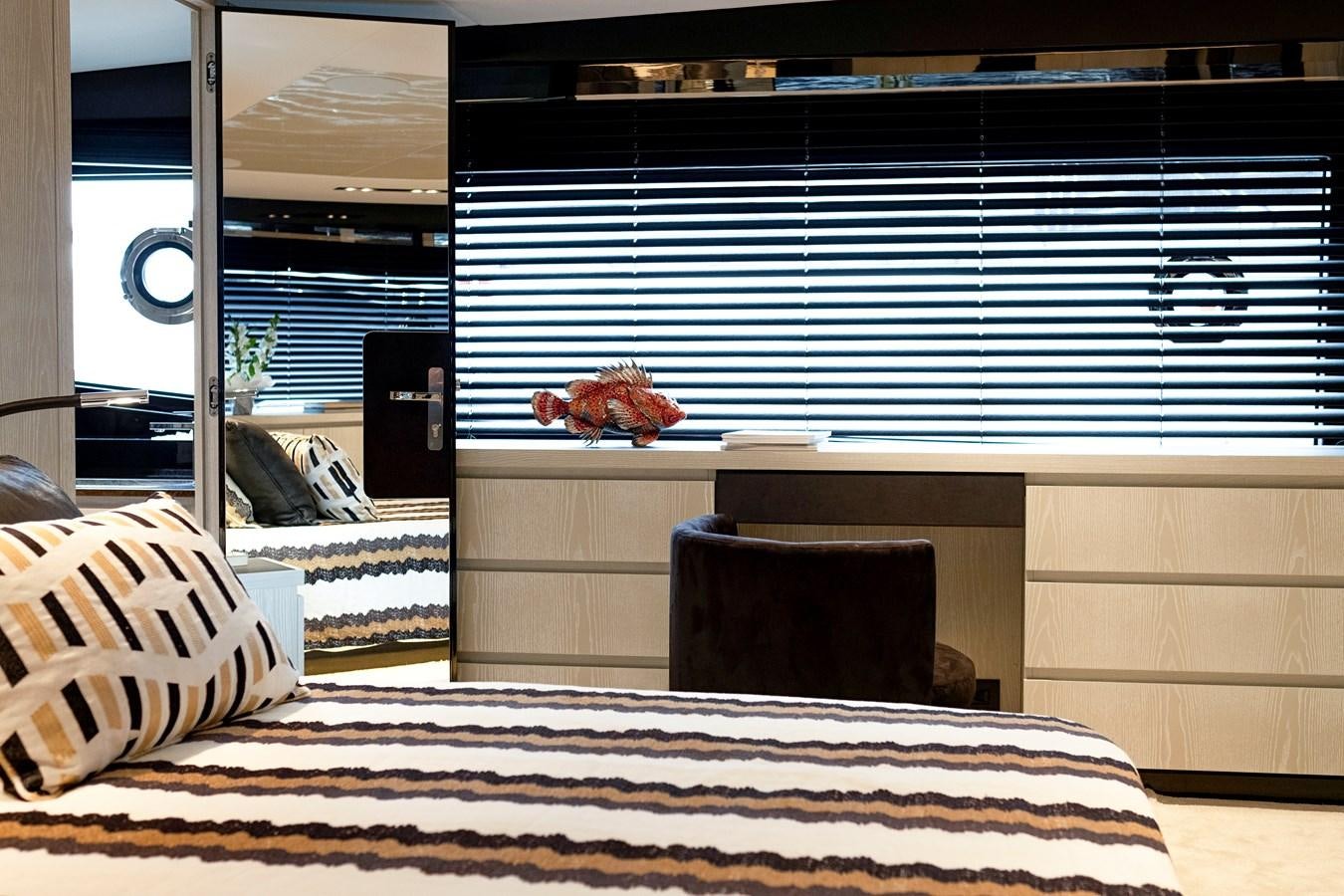 a room with a bed and a chair aboard ALIX Yacht for Sale