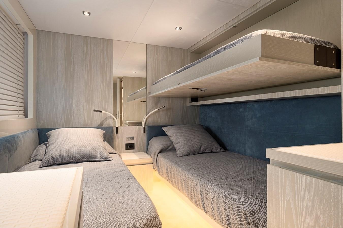 a room with a bed and a couch aboard ALIX Yacht for Sale