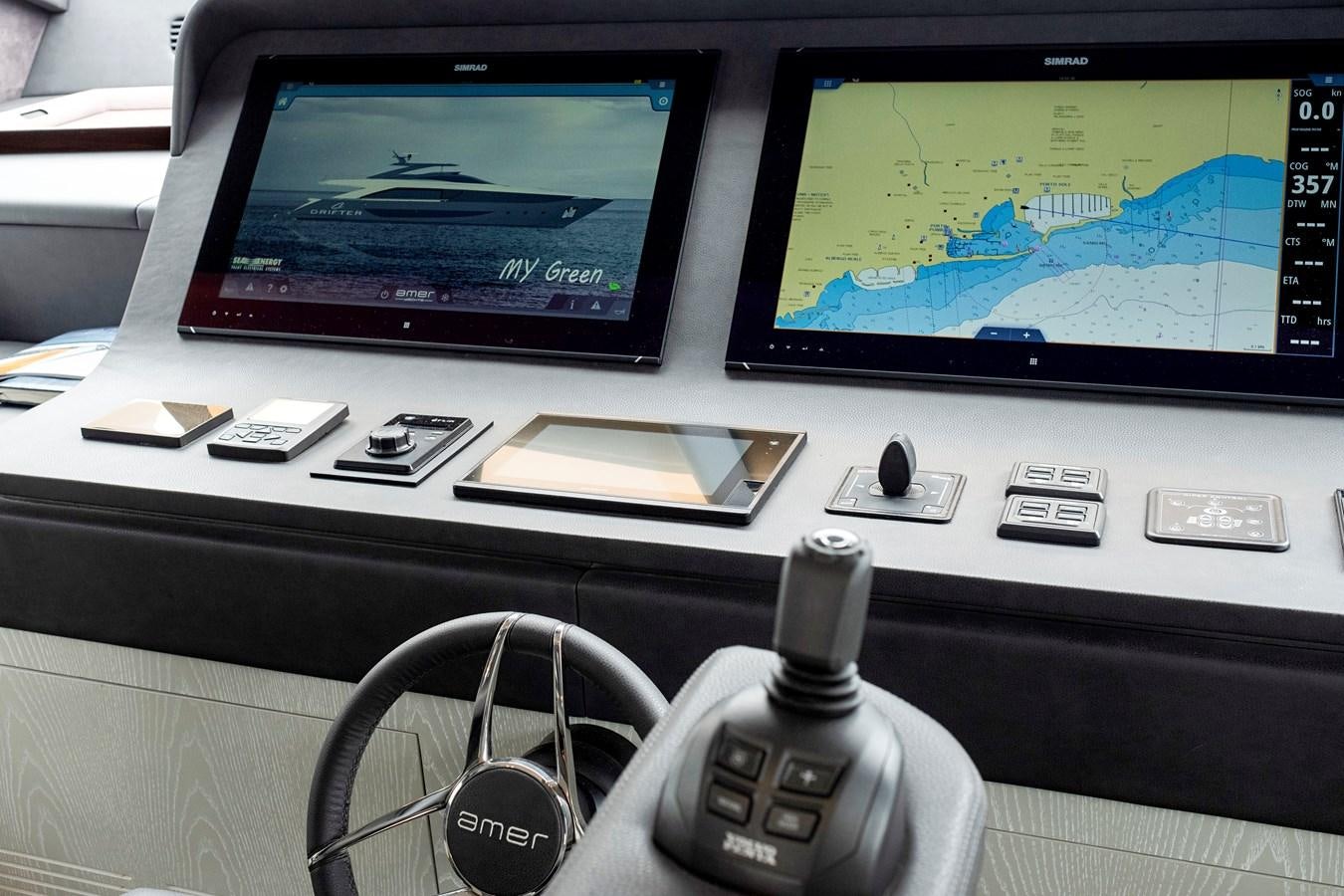 a gaming system with a monitor and a game controller aboard ALIX Yacht for Sale