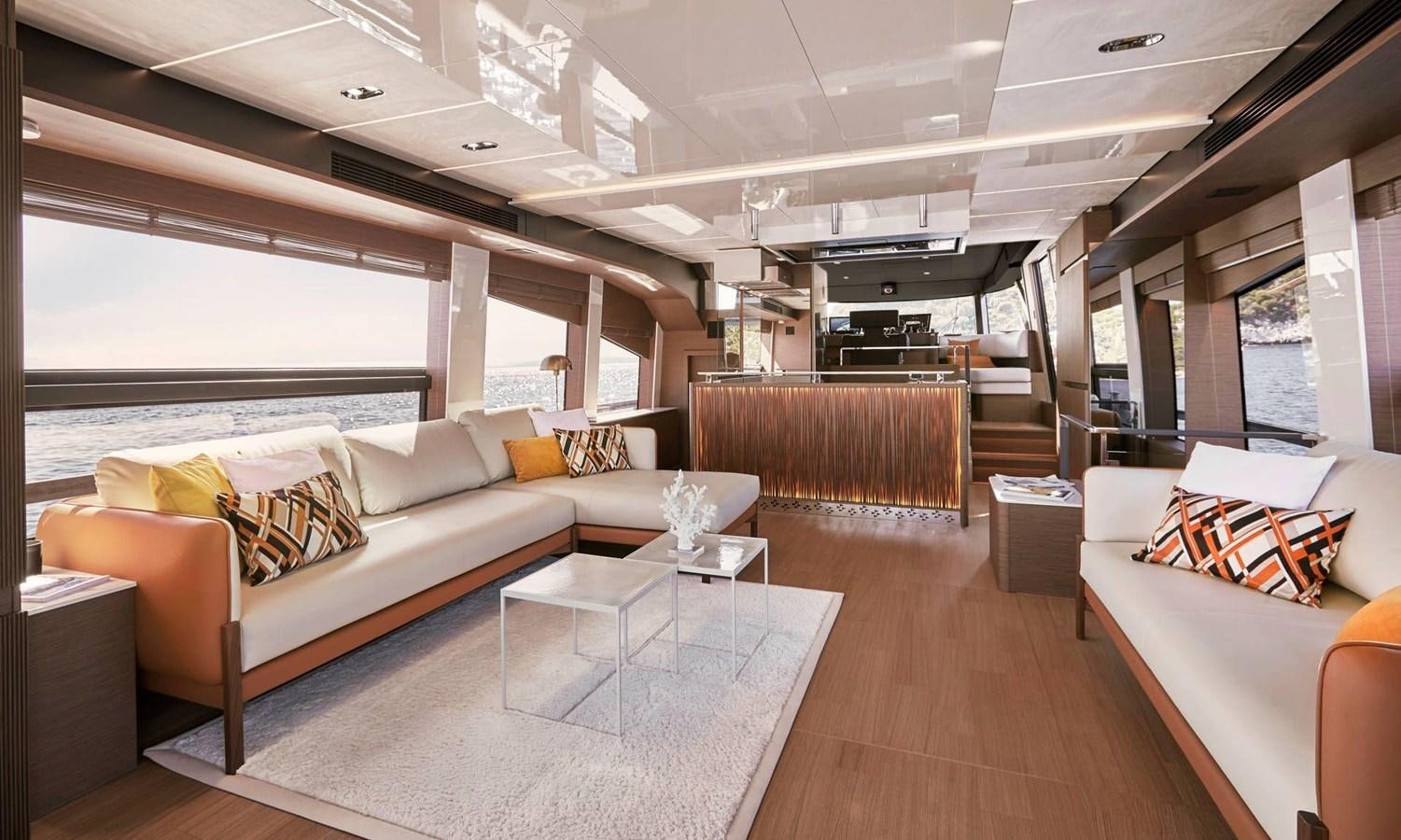 a living room with a large window aboard PRESTIGE X70 Yacht for Sale