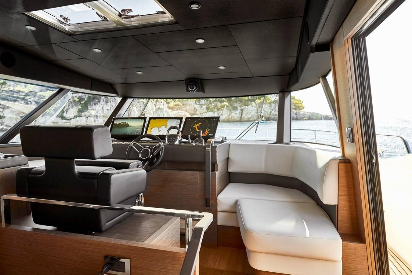 inside of a car aboard PRESTIGE X70 Yacht for Sale