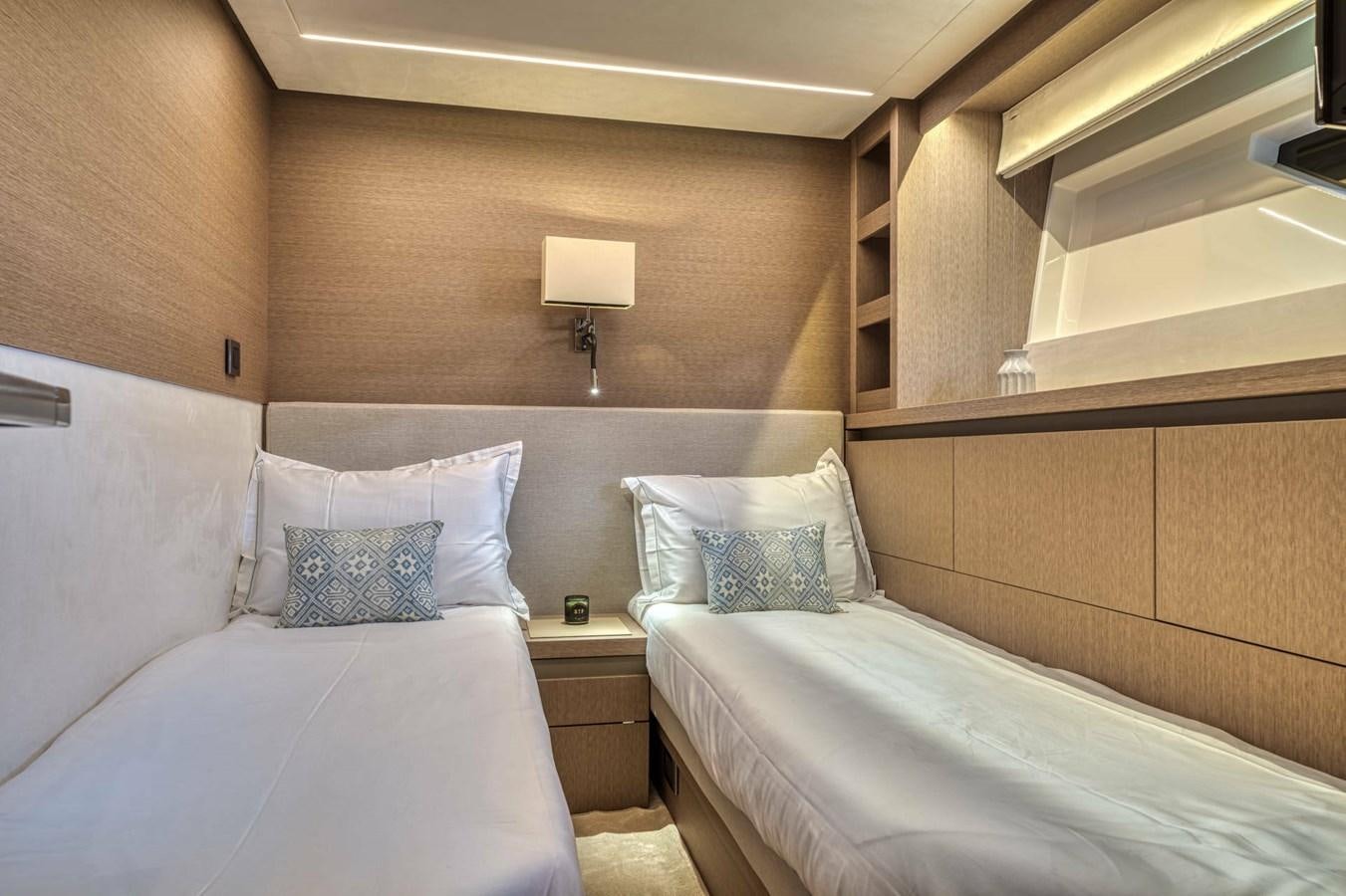 a room with two beds aboard 690 F LINE  Yacht for Sale