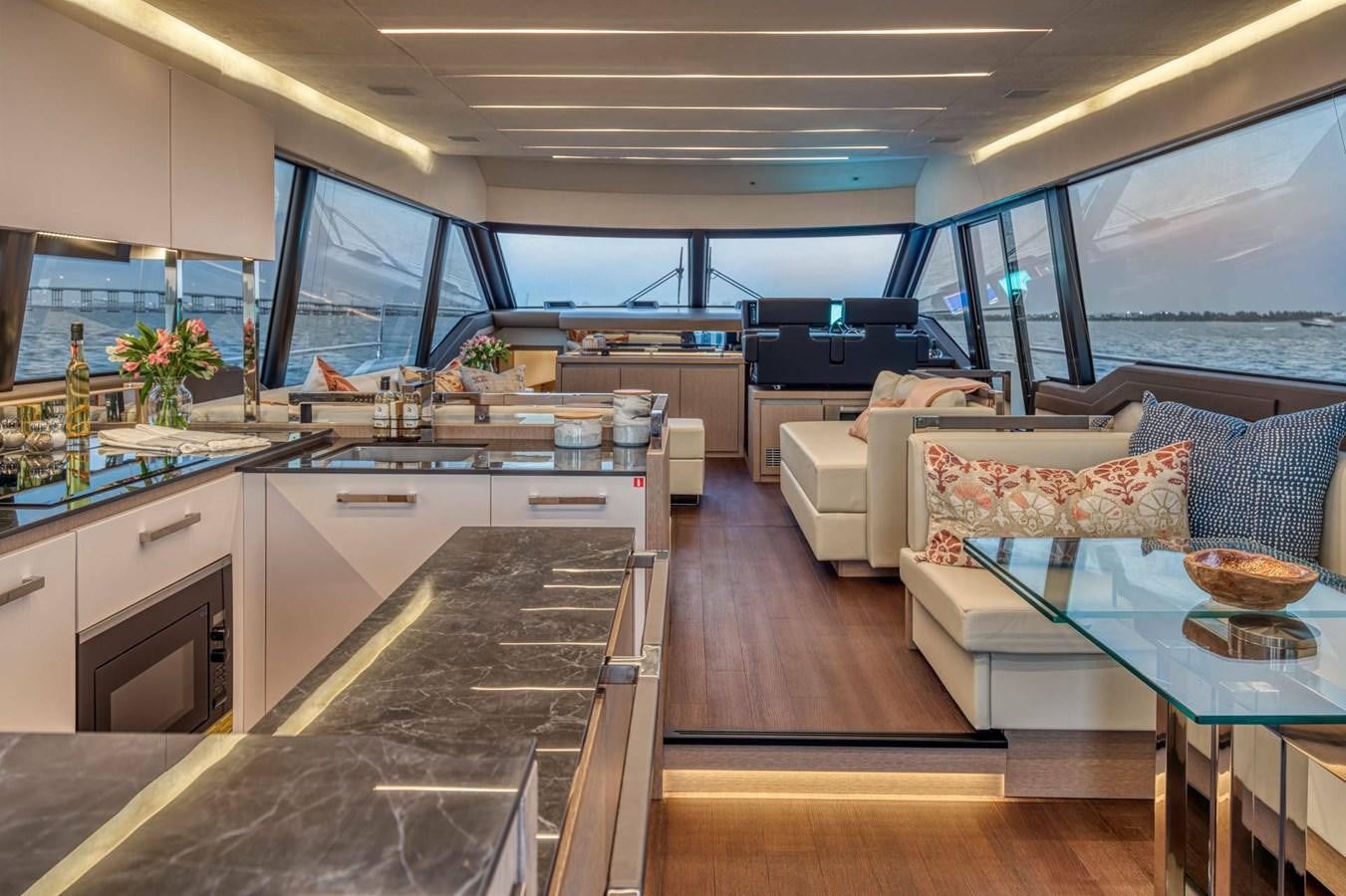 a modern looking kitchen with a large window aboard 690 F LINE  Yacht for Sale