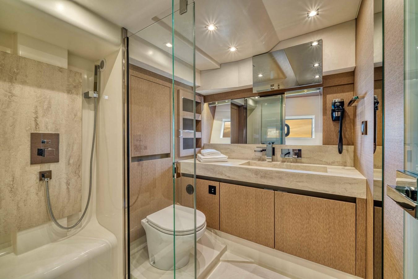 a bathroom with a glass shower aboard 690 F LINE  Yacht for Sale