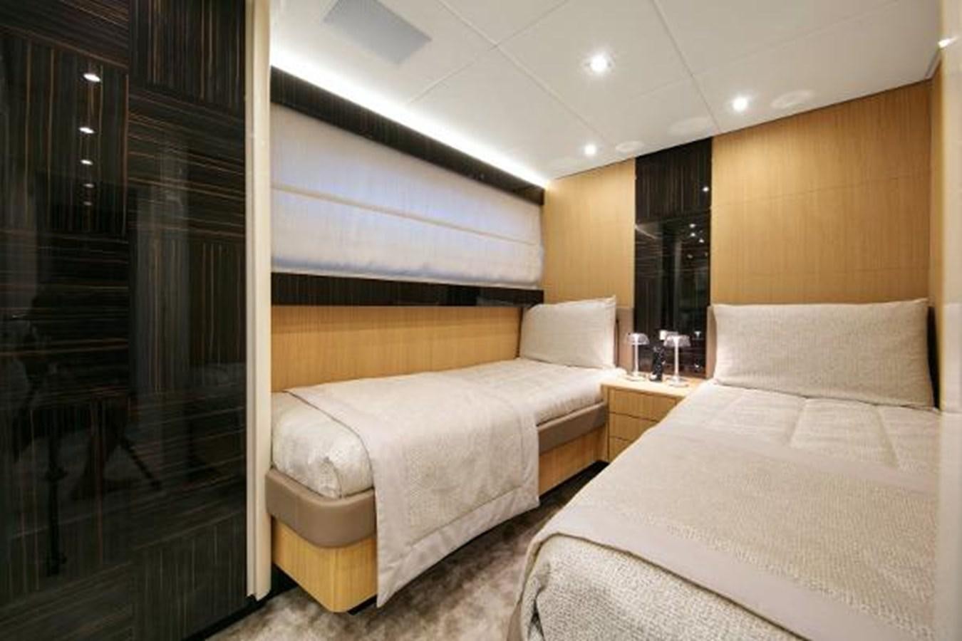 a room with two beds aboard URSUS Yacht for Sale