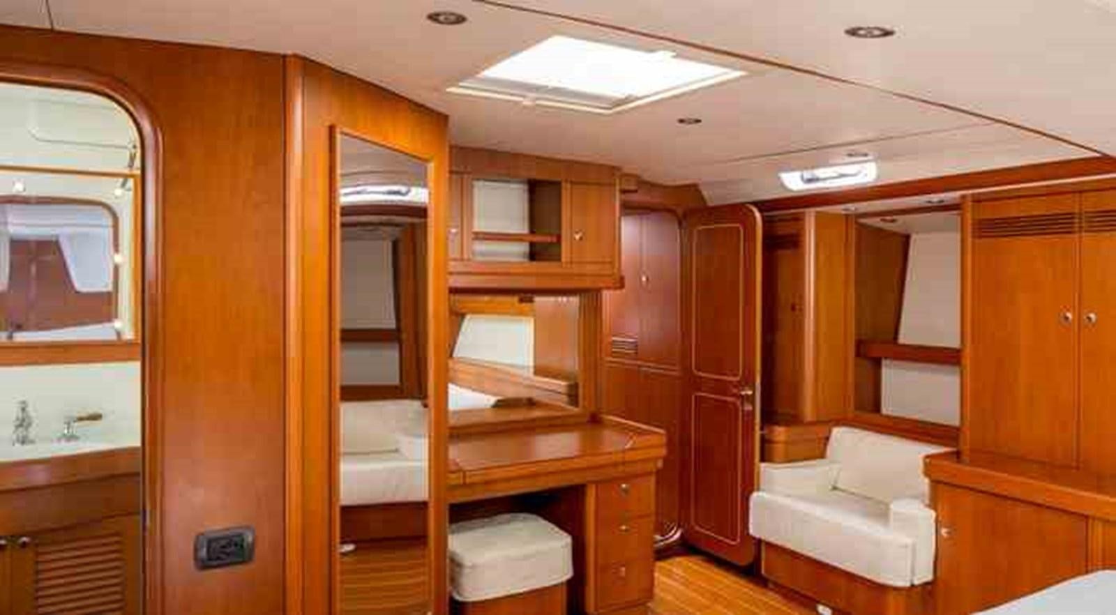 a room with a bunk bed and a couch aboard ELISE WHISPER Yacht for Sale