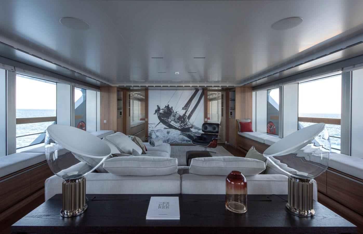 a room with a large bed and a large window aboard MYKO Yacht for Sale