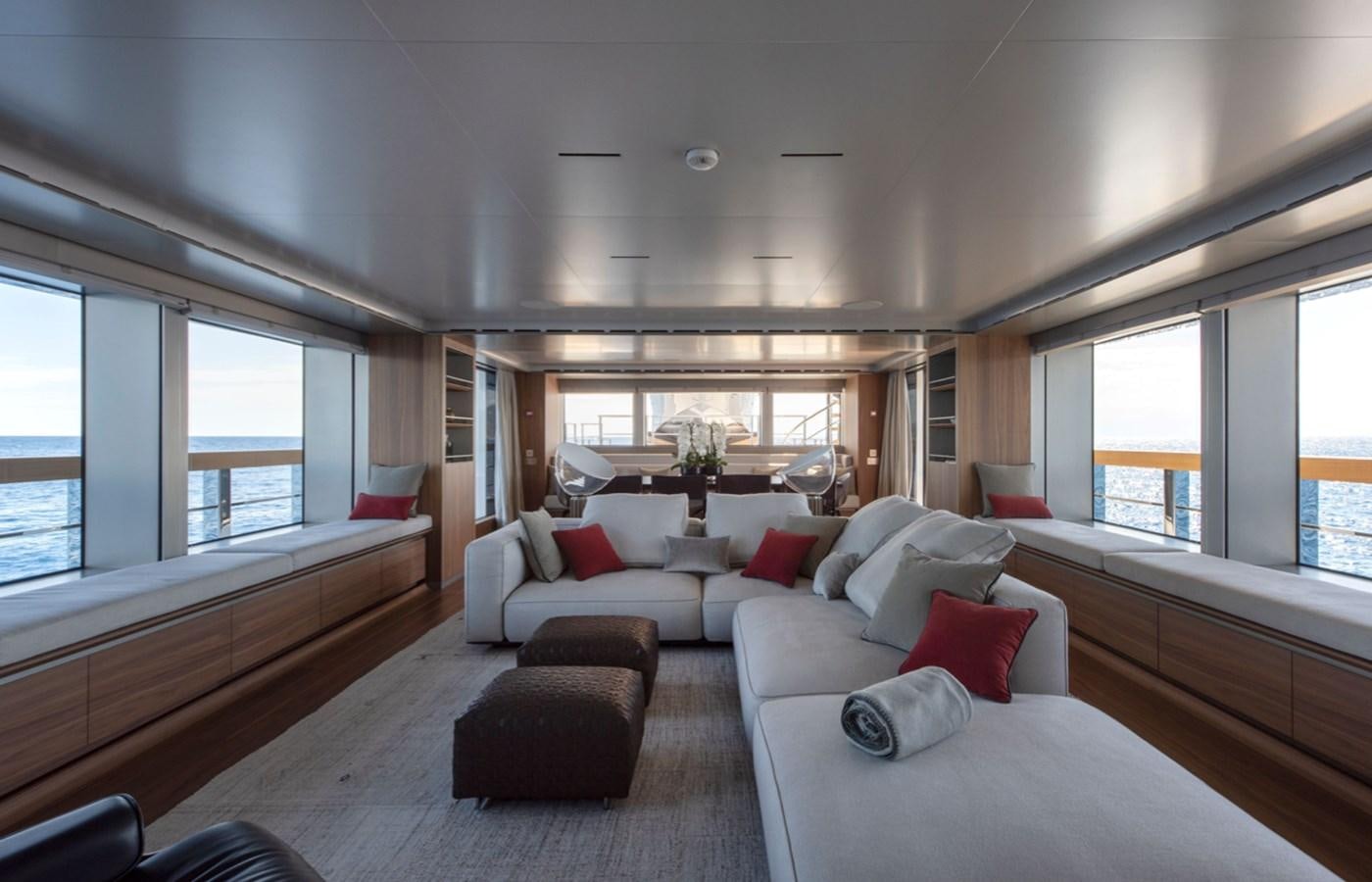 a large living room with a large window aboard MYKO Yacht for Sale