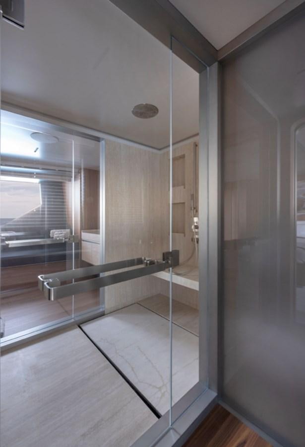 a room with glass doors aboard MYKO Yacht for Sale