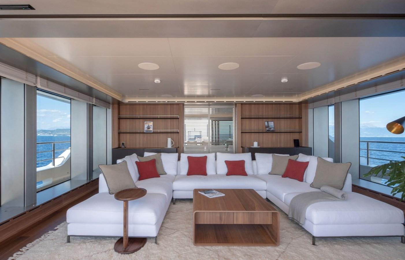 a large living room with a large window aboard MYKO Yacht for Sale