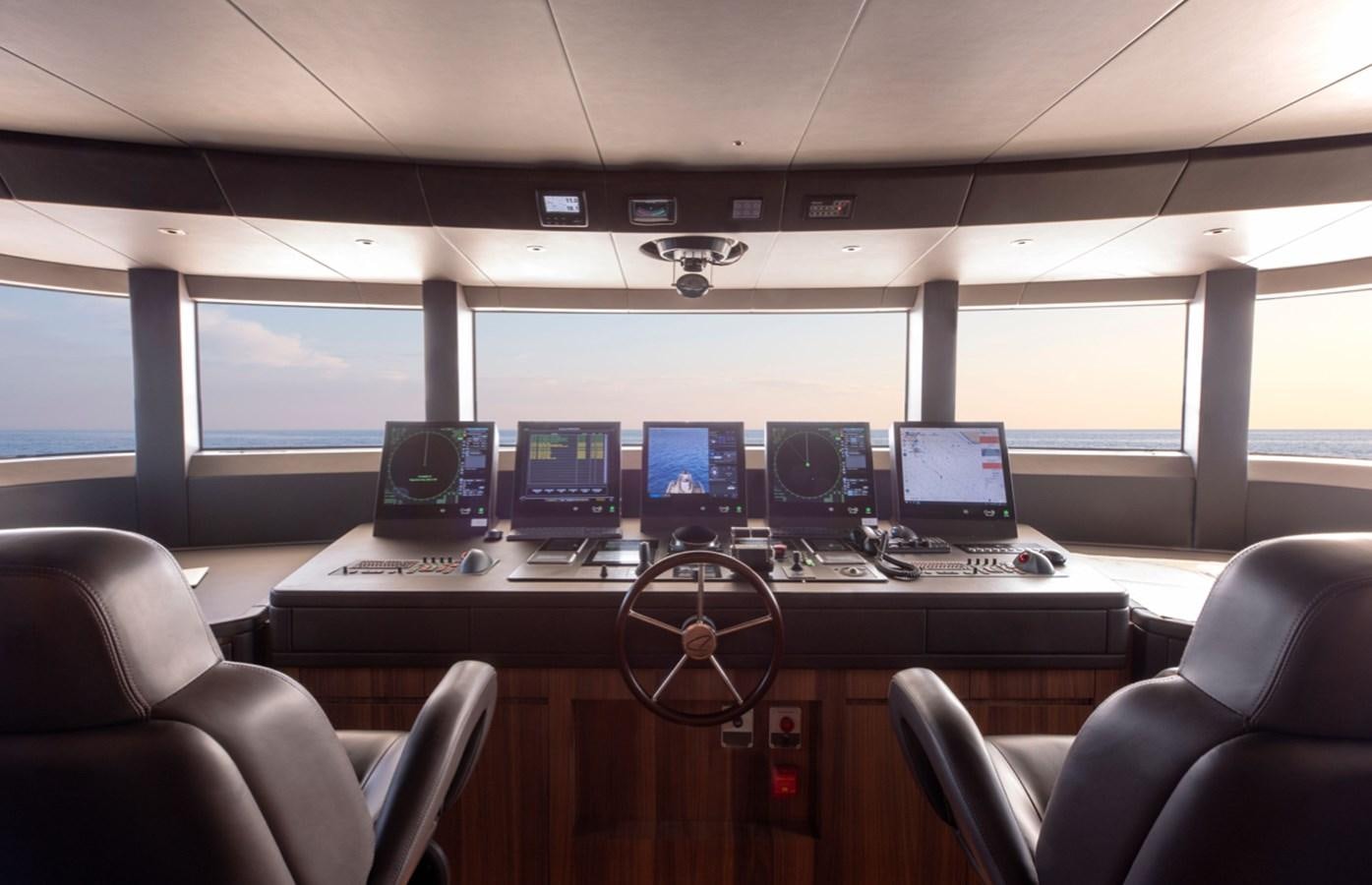 a control room with many computers aboard MYKO Yacht for Sale