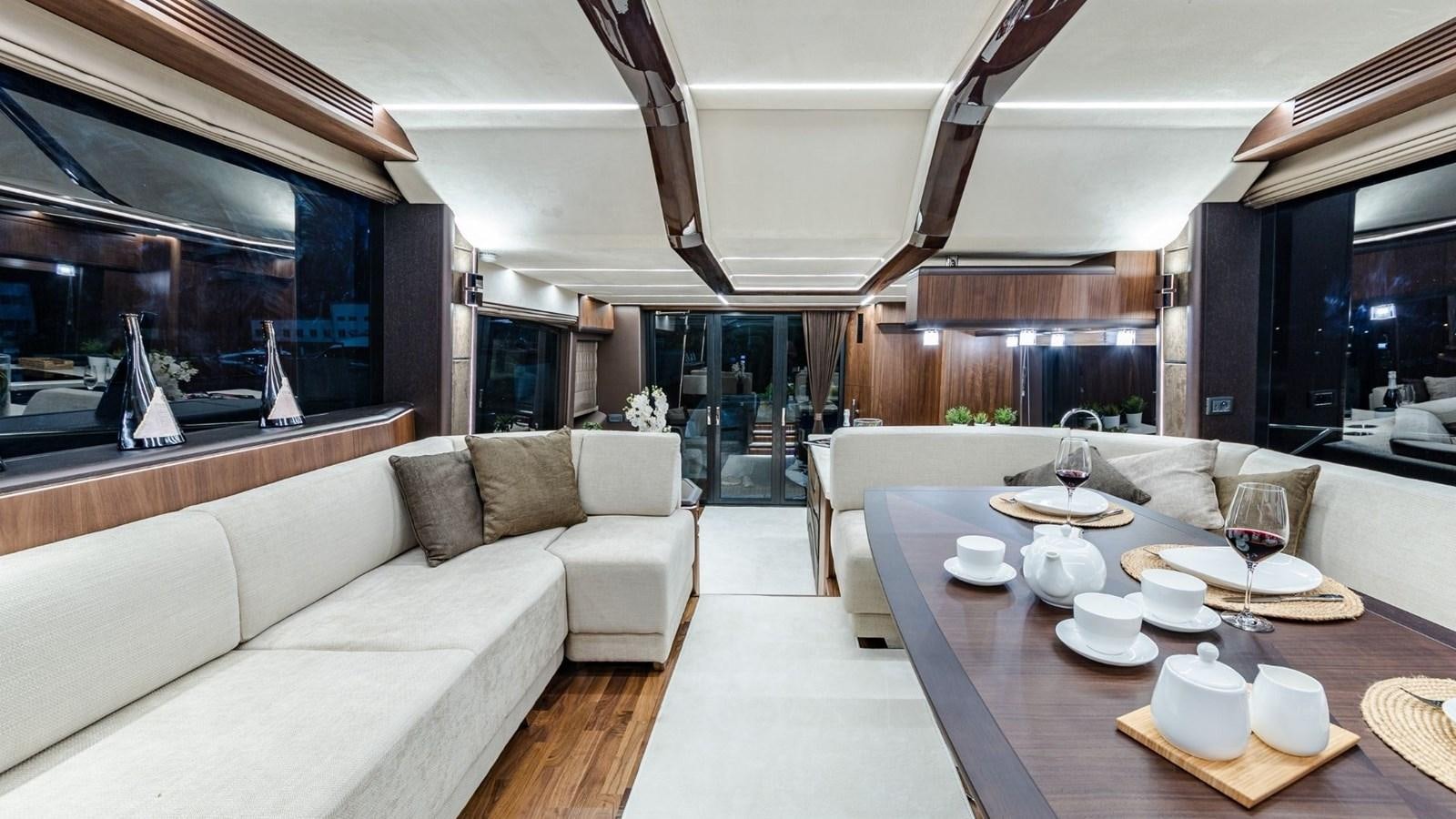 a large modern living room aboard GALEON 680 FLY Yacht for Sale