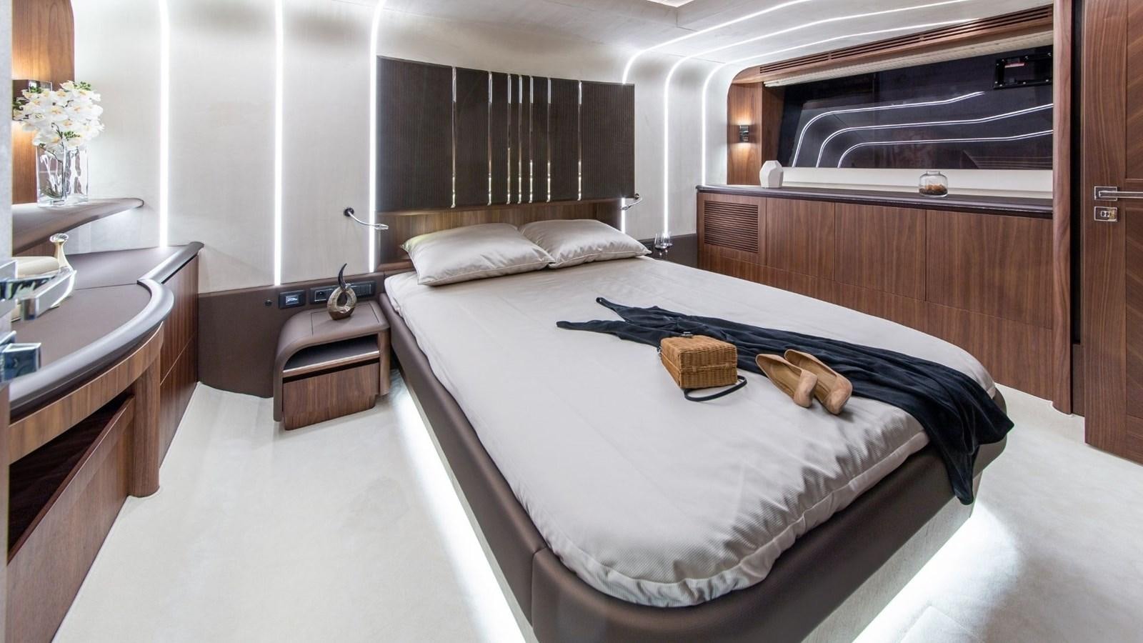 a large bed in a room aboard GALEON 680 FLY Yacht for Sale