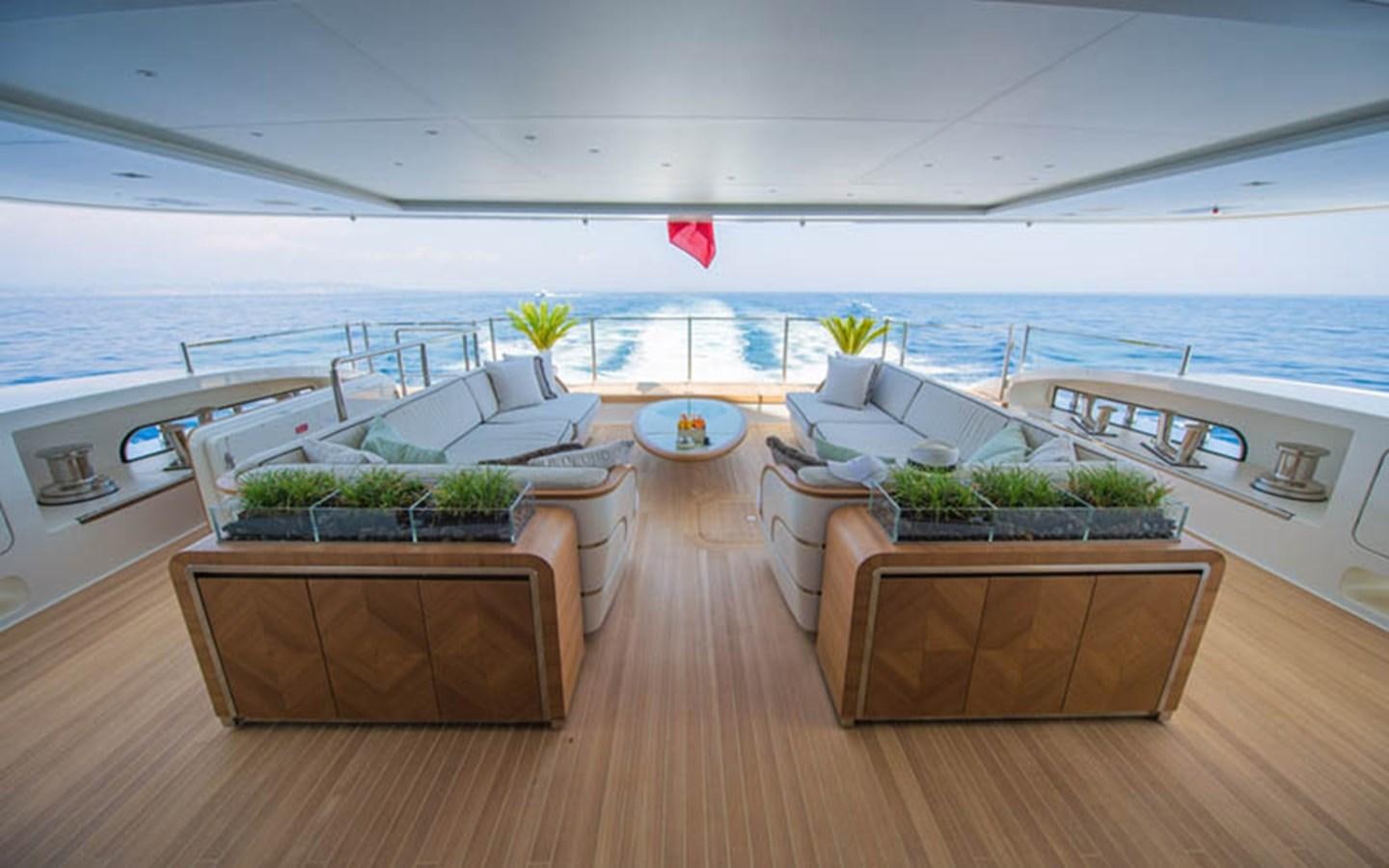 a room with a table and chairs aboard SCORPION Yacht for Sale