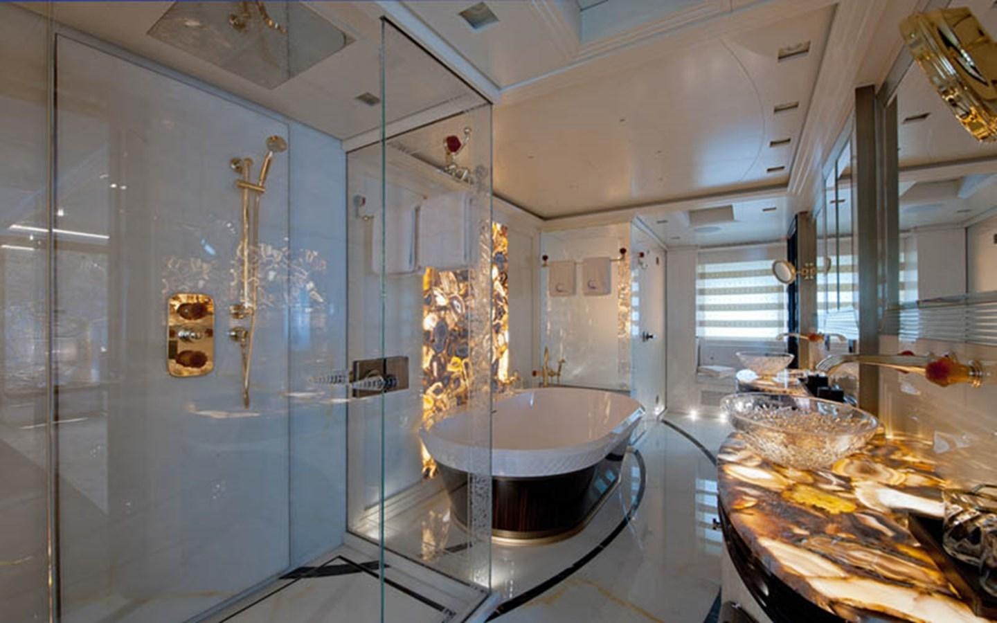a large bathroom with a large tub aboard SCORPION Yacht for Sale