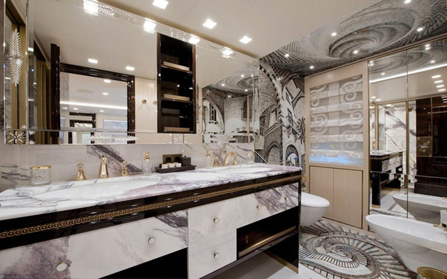 a bathroom with a large marble counter aboard SCORPION Yacht for Sale