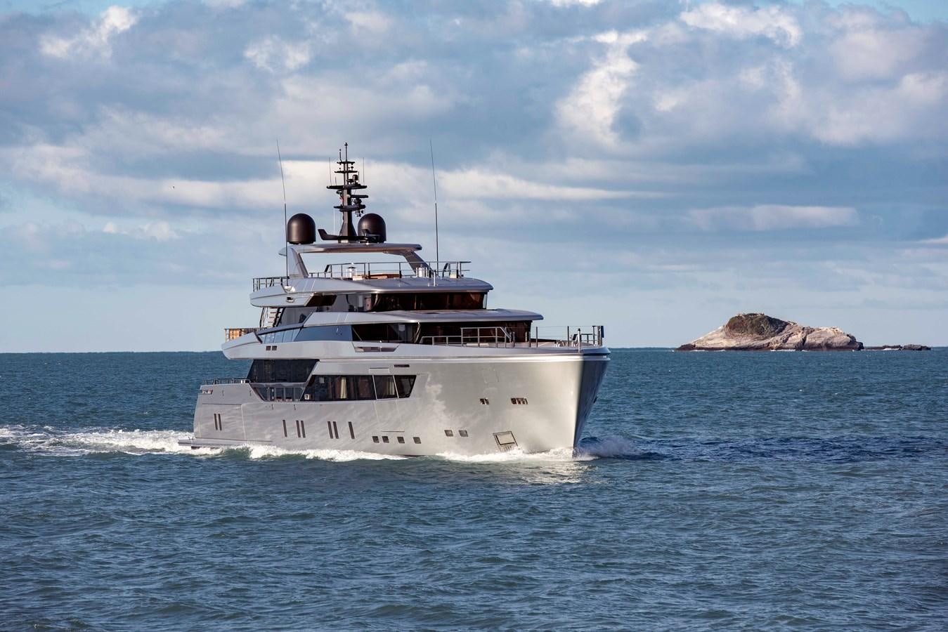 a large white ship in the water aboard PAIZA ONE Yacht for Sale