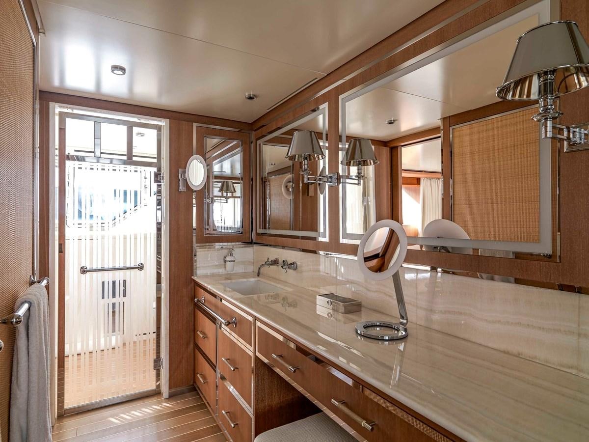 a bathroom with a large countertop aboard PAIZA ONE Yacht for Sale
