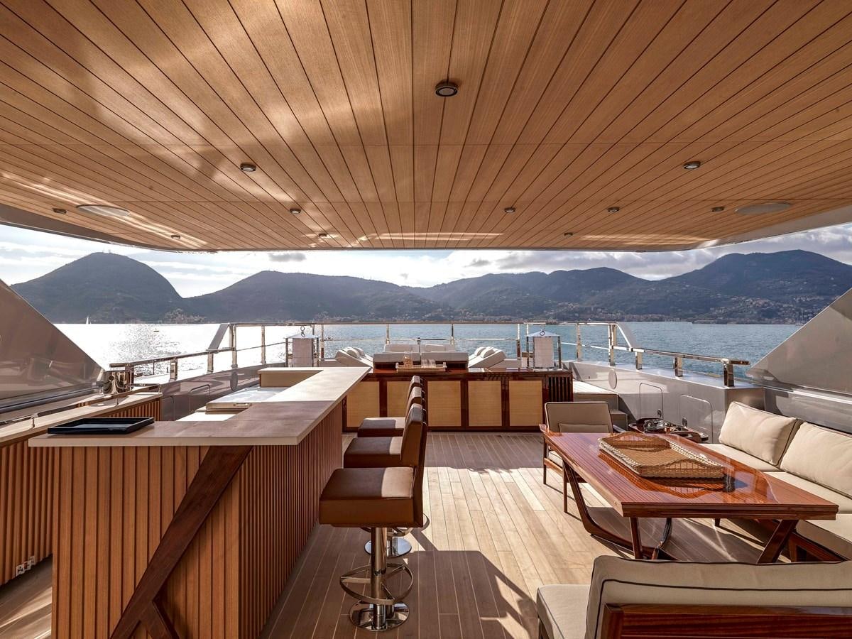 a room with a view of the ocean and mountains aboard PAIZA ONE Yacht for Sale