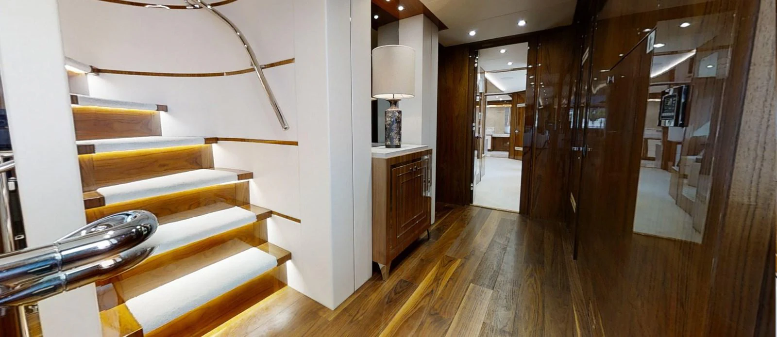 a room with wooden furniture aboard ALADDIN Yacht for Sale