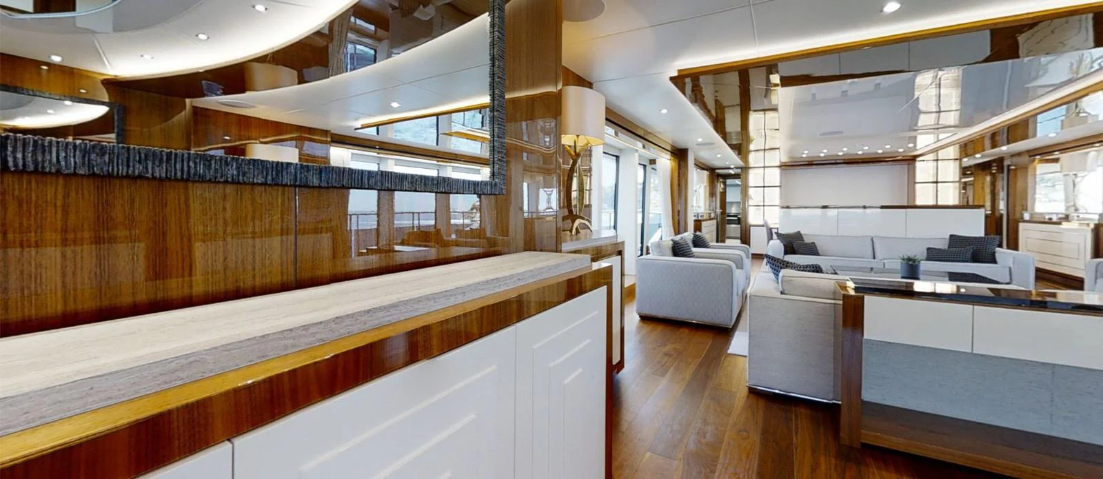 a room with a couch and a table aboard ALADDIN Yacht for Sale