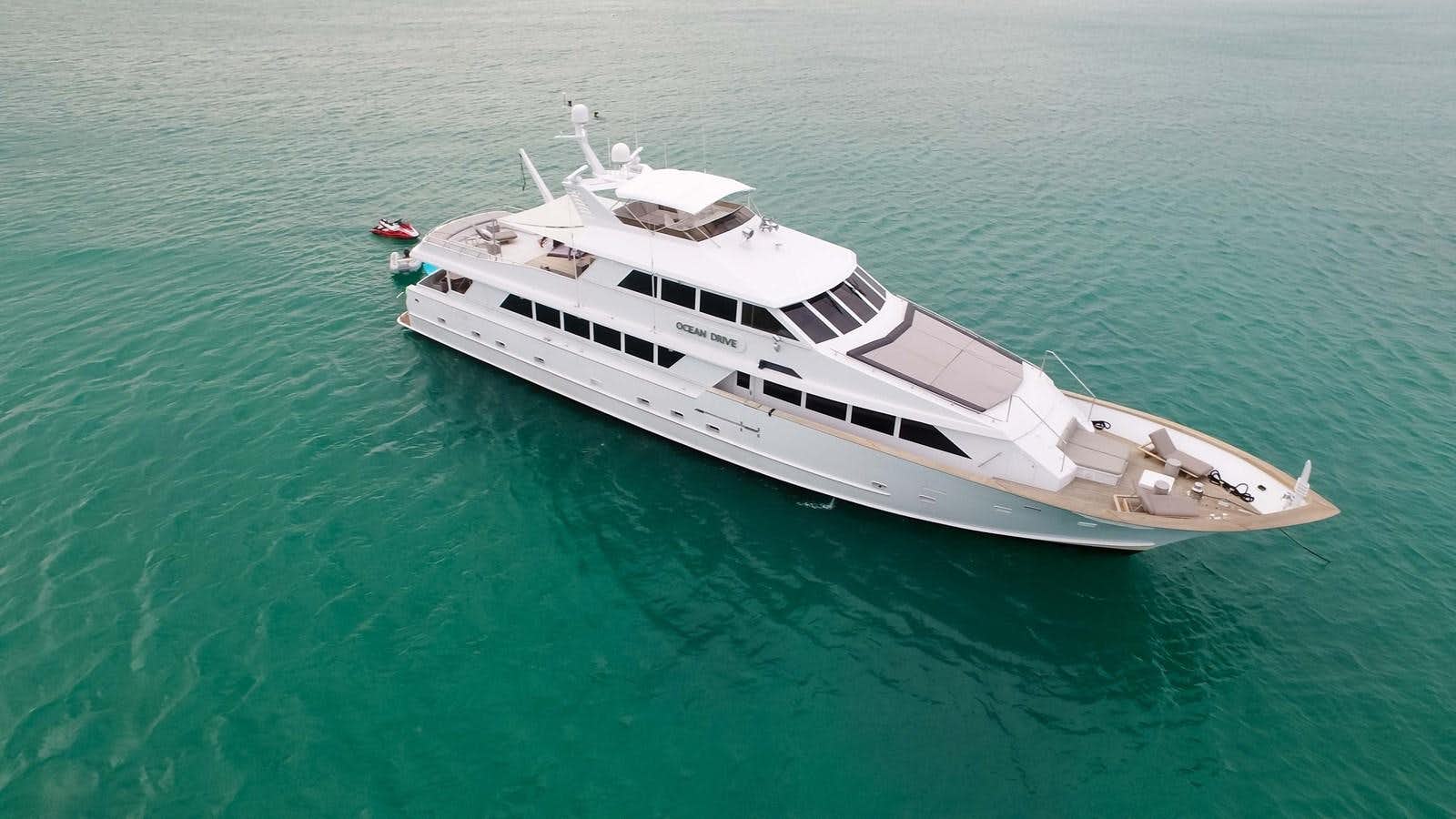 a white boat in the water aboard OCEAN DRIVE Yacht for Sale
