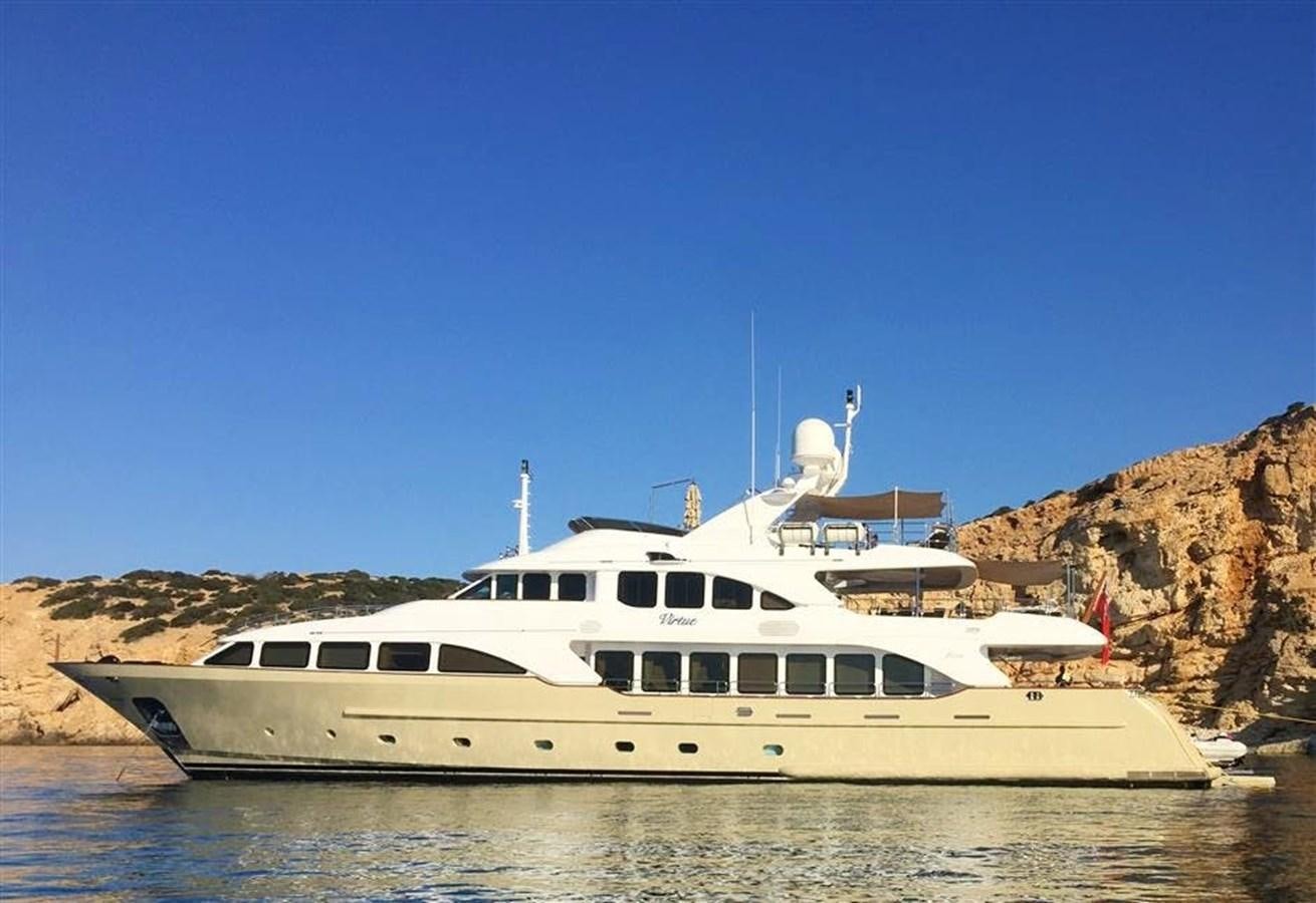 a white yacht in the water aboard VIRTUE Yacht for Sale