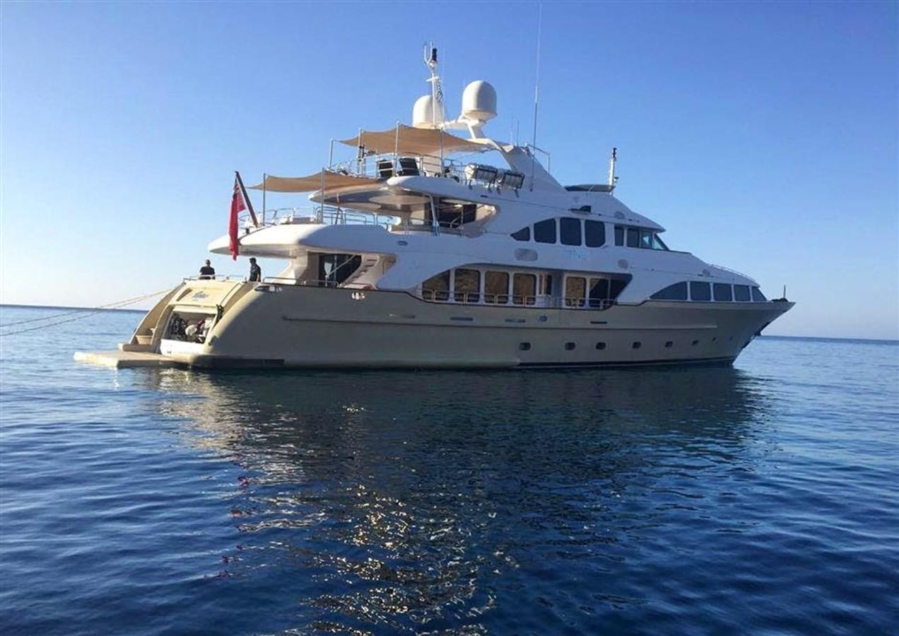 a large white boat in the water aboard VIRTUE Yacht for Sale