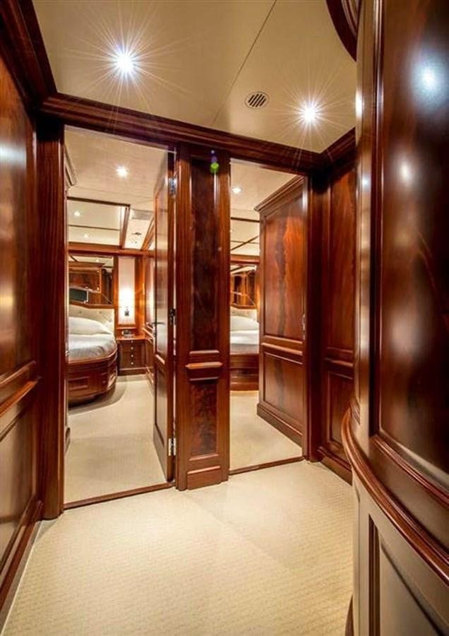 a room with a door and a mirror aboard VIRTUE Yacht for Sale