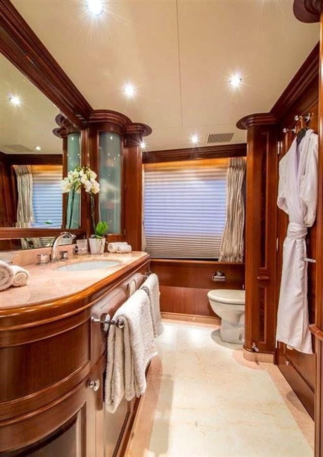 a bathroom with a sink and a toilet aboard VIRTUE Yacht for Sale