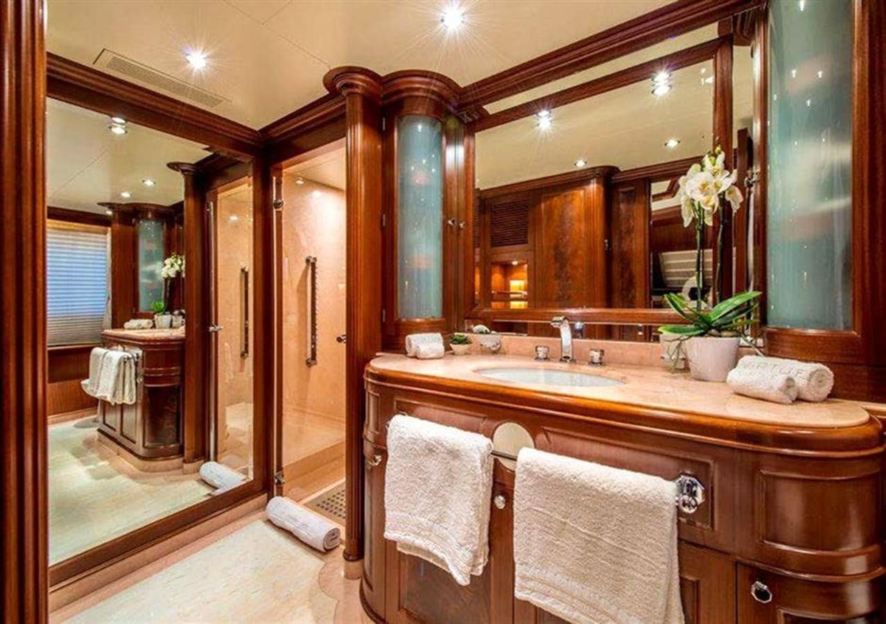 a bathroom with a large mirror aboard VIRTUE Yacht for Sale