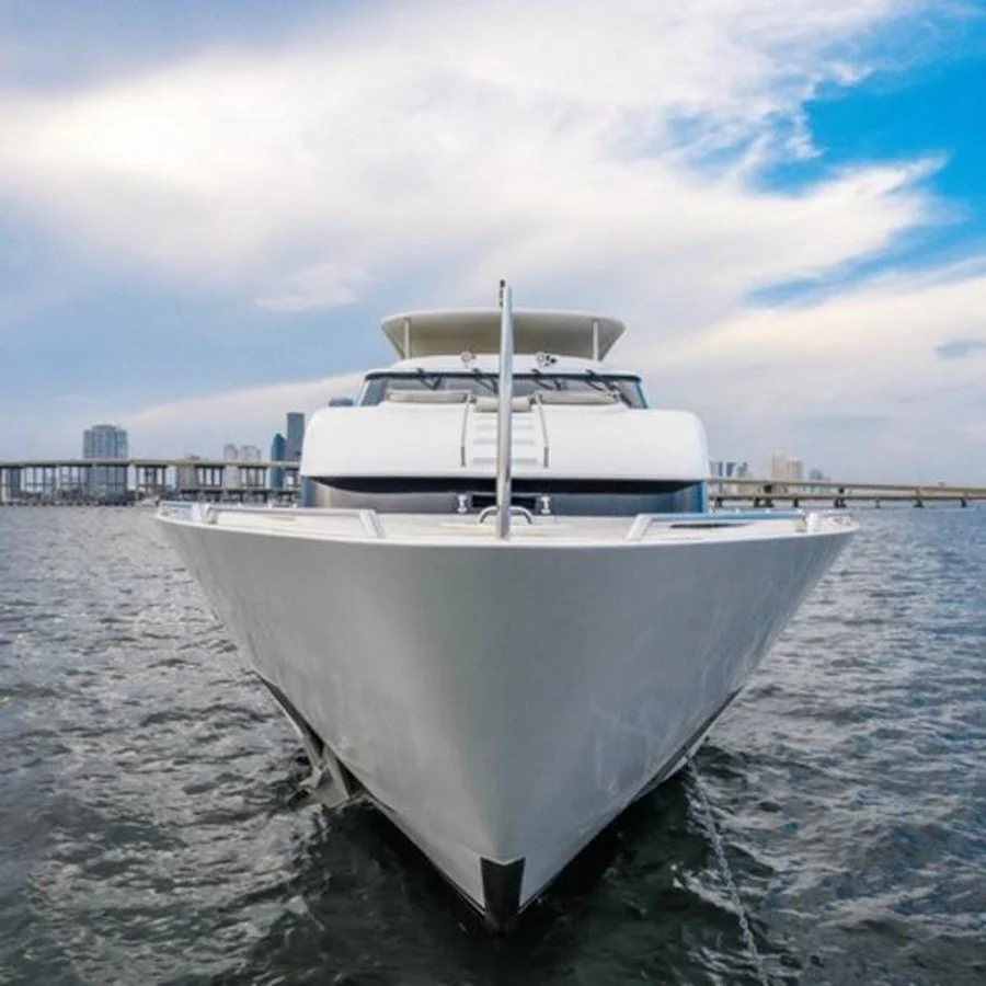 a white boat in the water aboard 2000 116 BAGLIETTO Yacht for Sale
