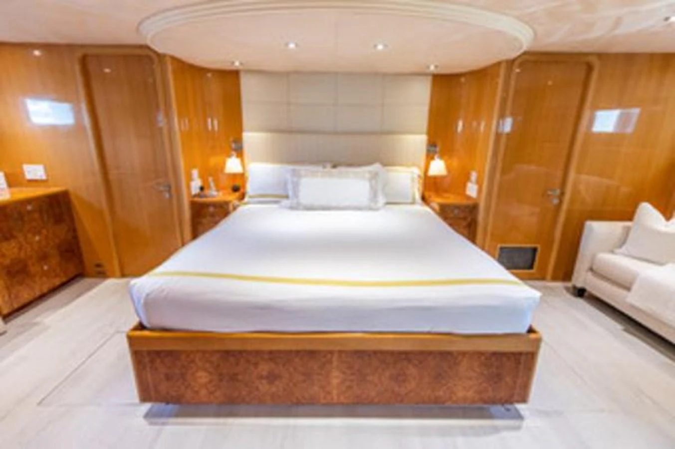 a large bed in a room aboard 2000 116 BAGLIETTO Yacht for Sale