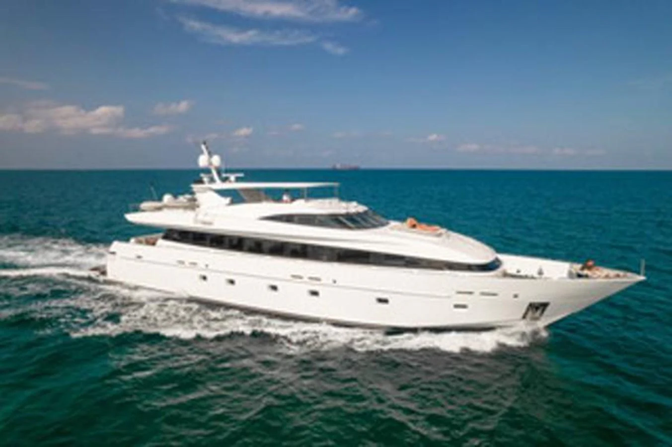 a white yacht on the water aboard 2000 116 BAGLIETTO Yacht for Sale