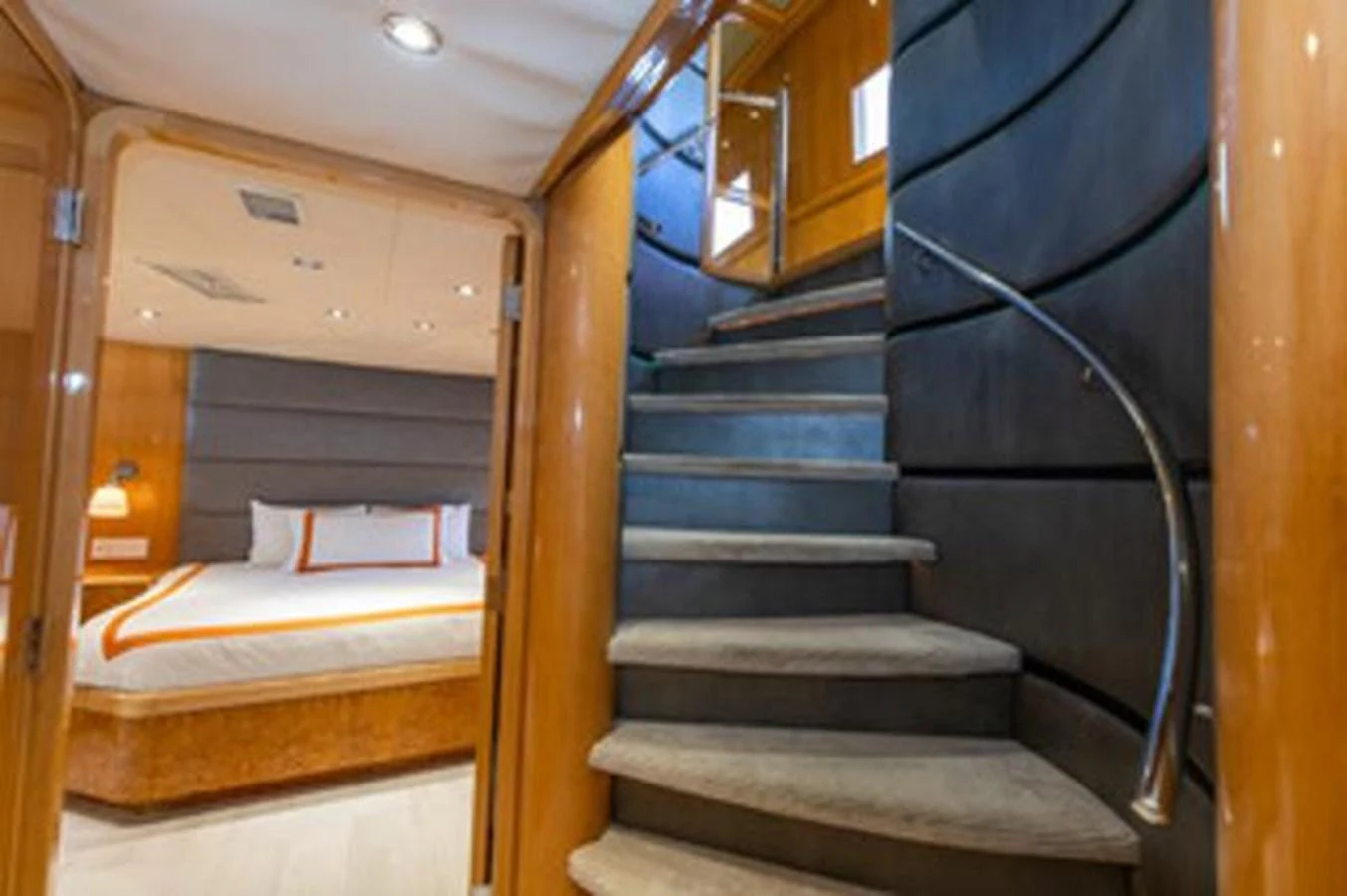 a set of stairs leading to a room aboard 2000 116 BAGLIETTO Yacht for Sale