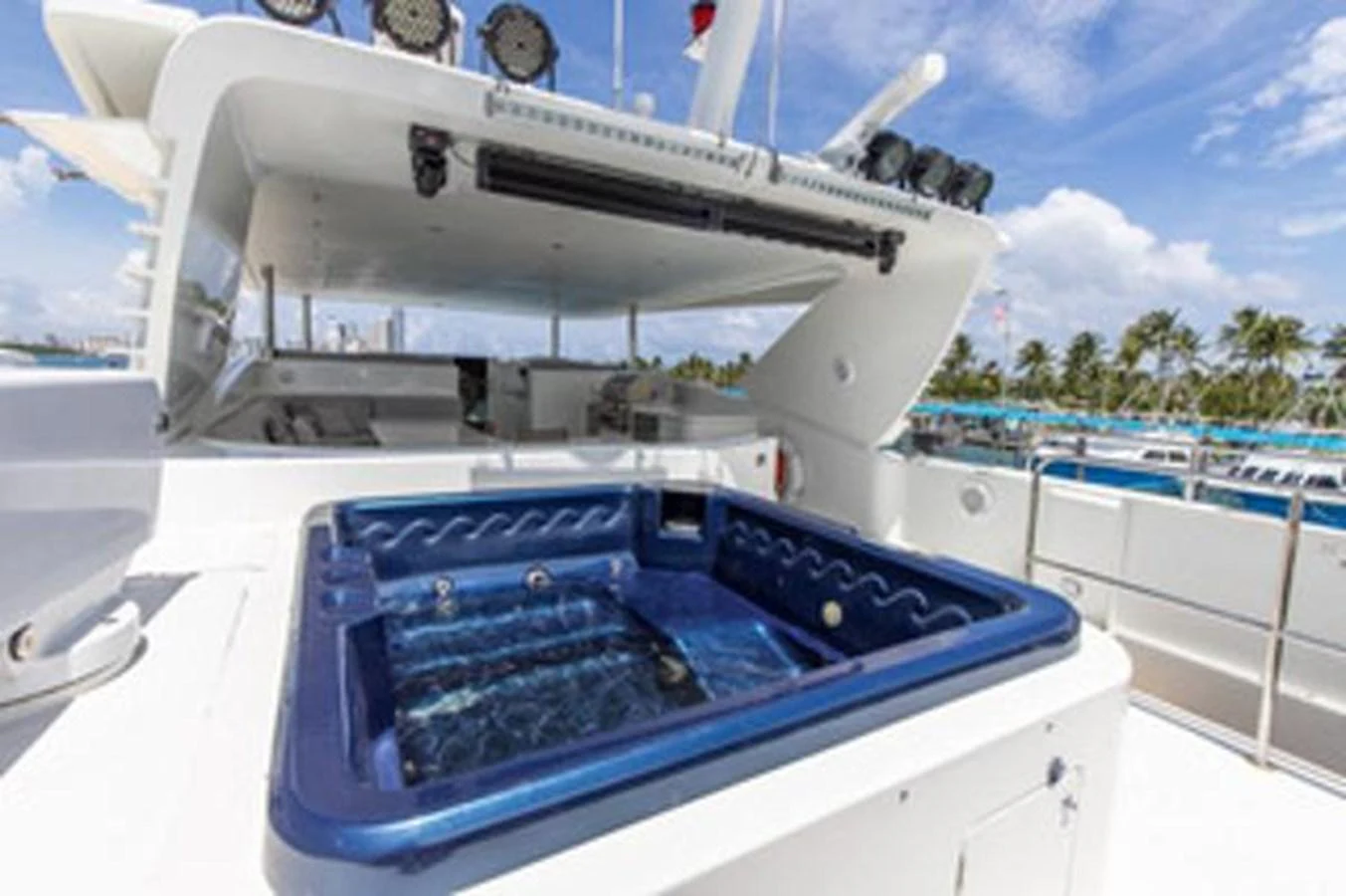 a large white boat with a blue canopy on it aboard 2000 116 BAGLIETTO Yacht for Sale