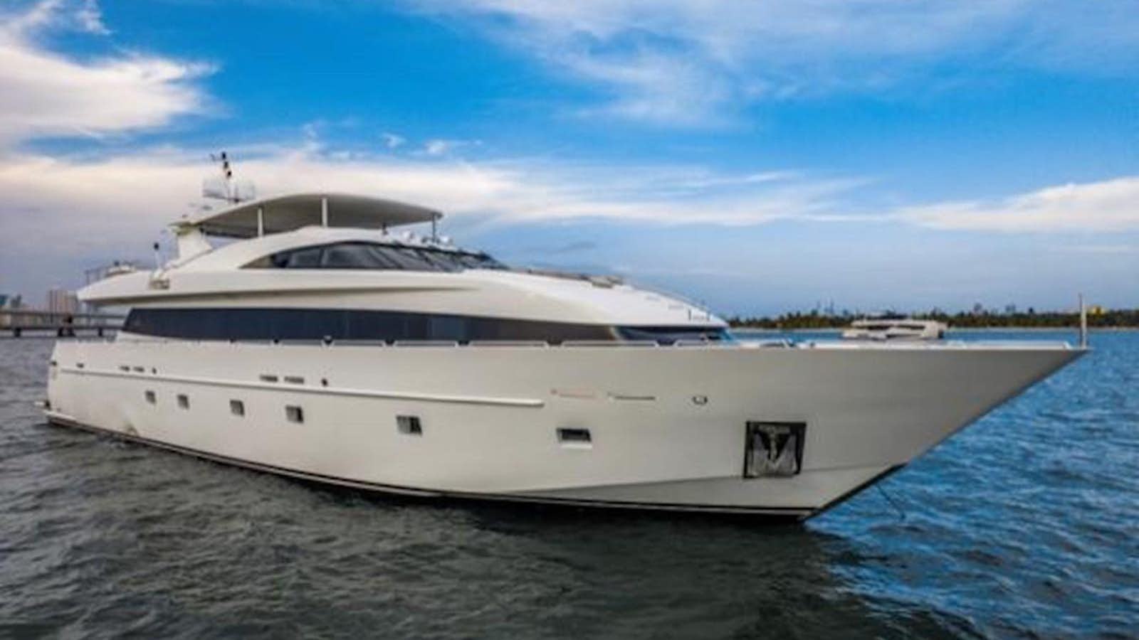 a large white yacht on the water aboard 2000 116 BAGLIETTO Yacht for Sale