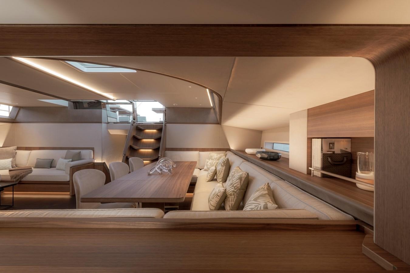 a room with a bed and a couch aboard CEFEA Yacht for Sale