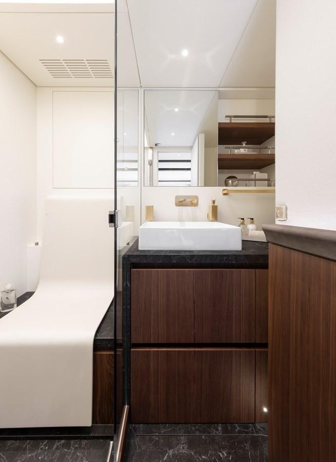 a bathroom with a sink and cabinets aboard CEFEA Yacht for Charter