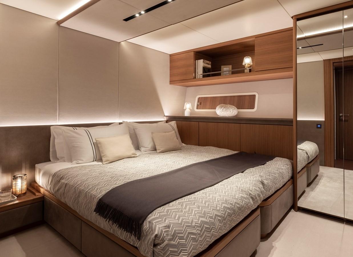 a bed in a room aboard CEFEA Yacht for Charter