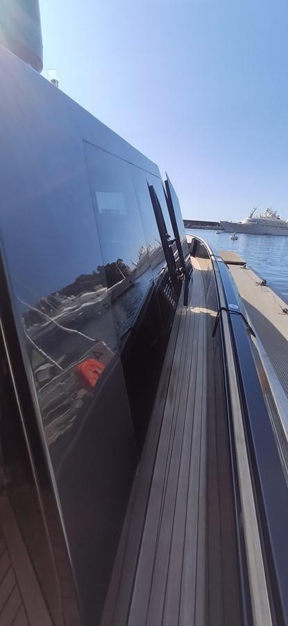 a person on a boat aboard ANOTHER TOY Yacht for Sale