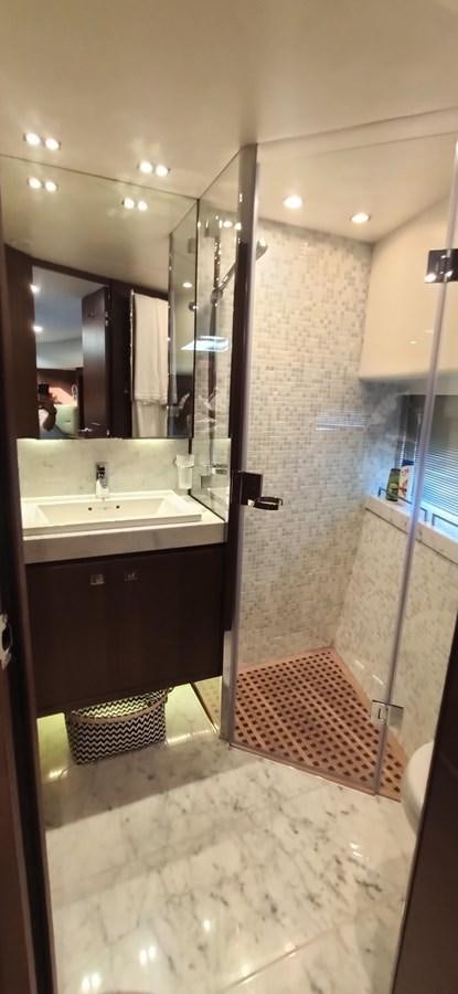 a bathroom with a sink and a mirror aboard ANOTHER TOY Yacht for Sale